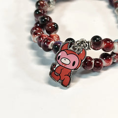 Charming beaded bracelet with cute character charms pendants.