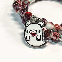 Charming beaded bracelet with cute character charms pendants.